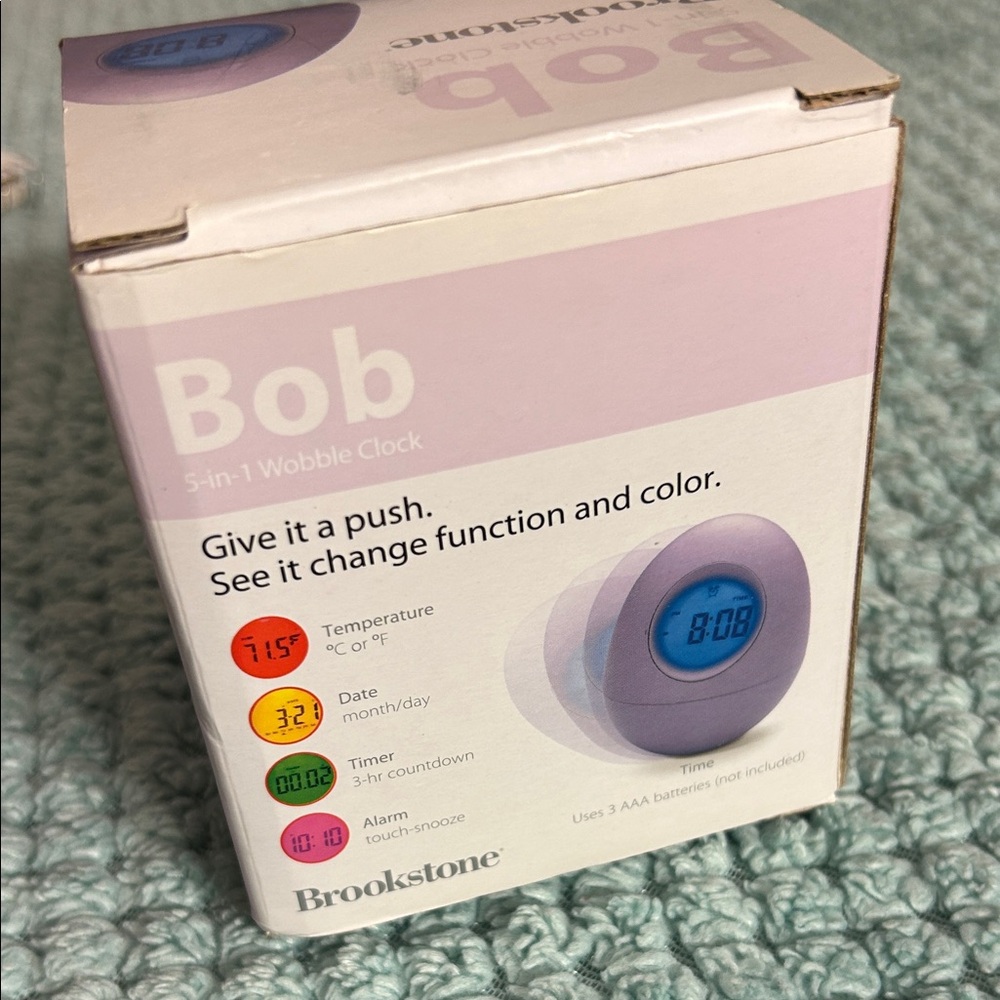 Brookstone Bob 5-in-1 Purple Color Wobble Clock ,NIB